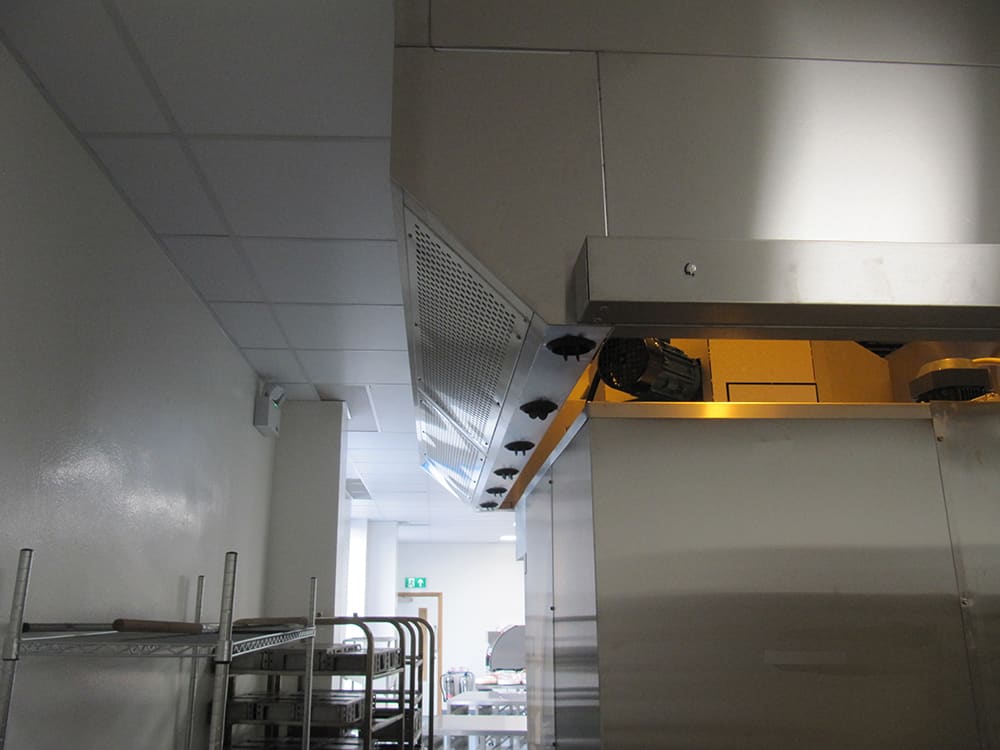 Back of Shaped Canopy with Sloping Supply Air Plenum commercial kitchen extraction canopy