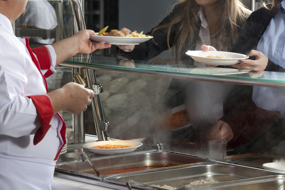 Chef,Standing,Behind,Full,Lunch,Service,Station